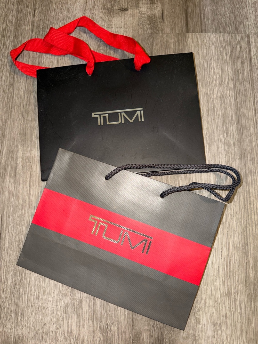 2 Tumi Shopping Bags in Black and Red